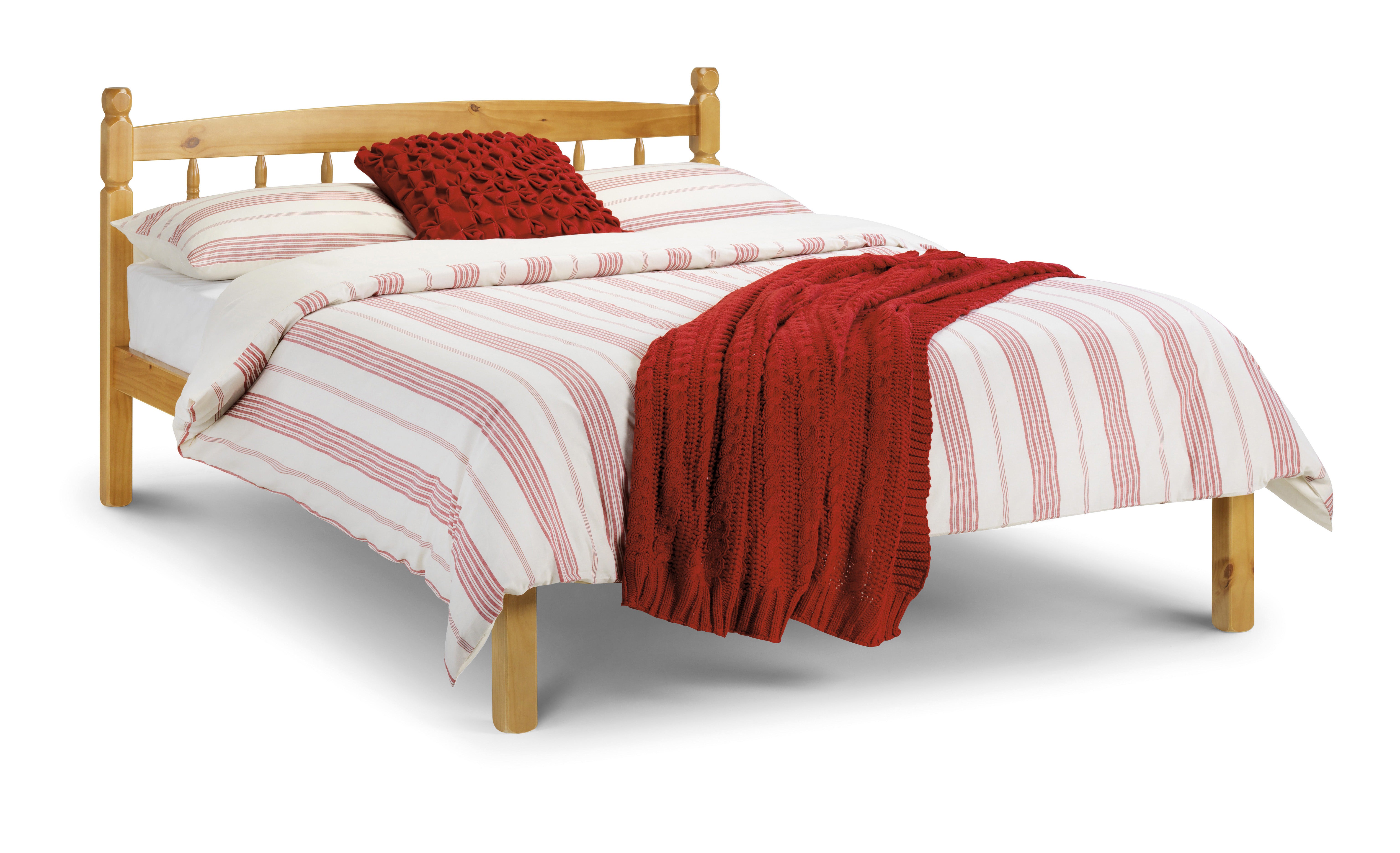 Wooden bed with red and white striped bedding and a red throw blanket on a white background