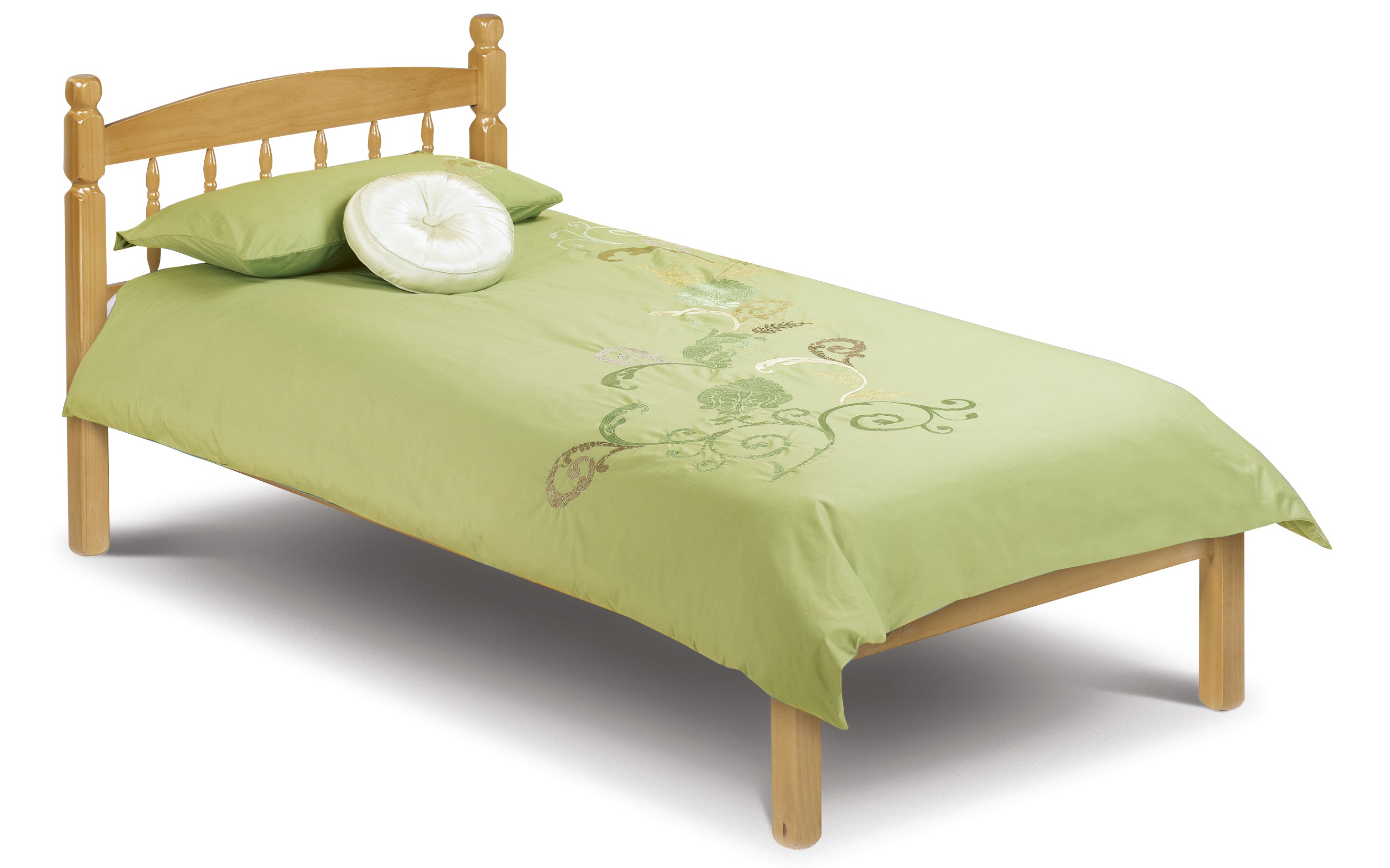 Single bed with green bedding and wooden headboard on a white background