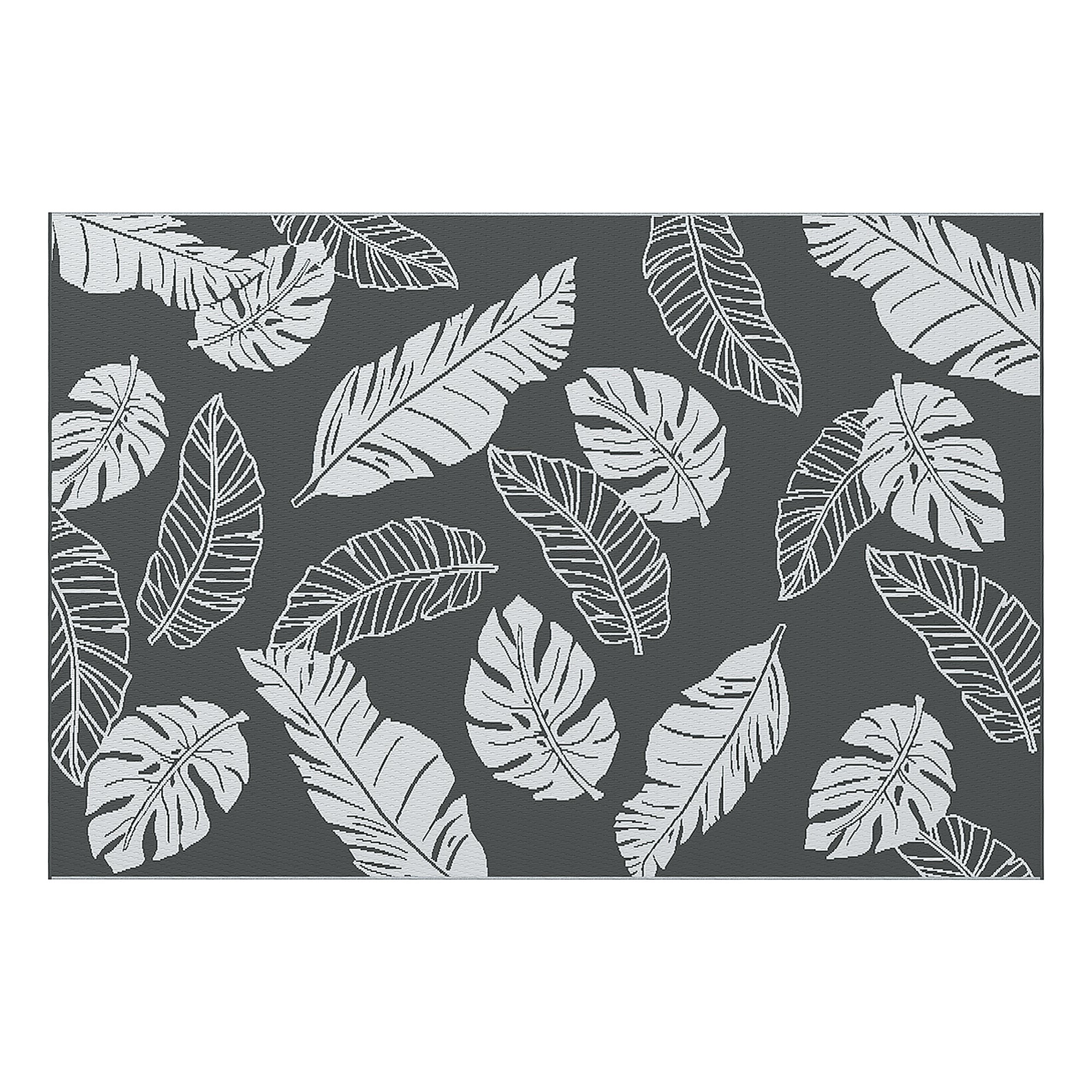 Pattern of white leaves on a dark gray background