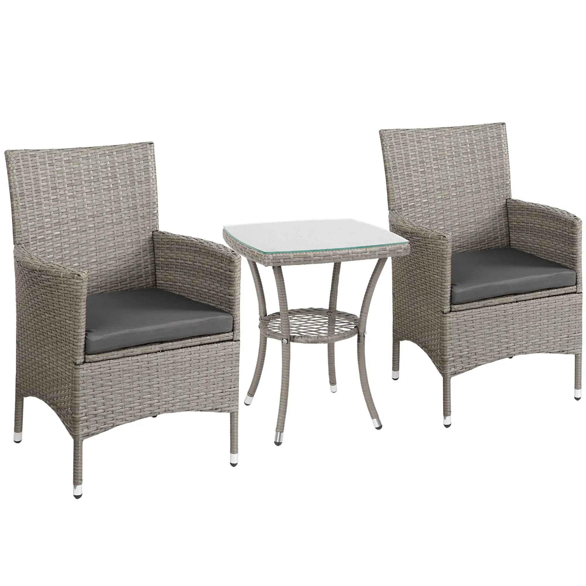 Two wicker chairs with gray cushions and a matching side table on a white background