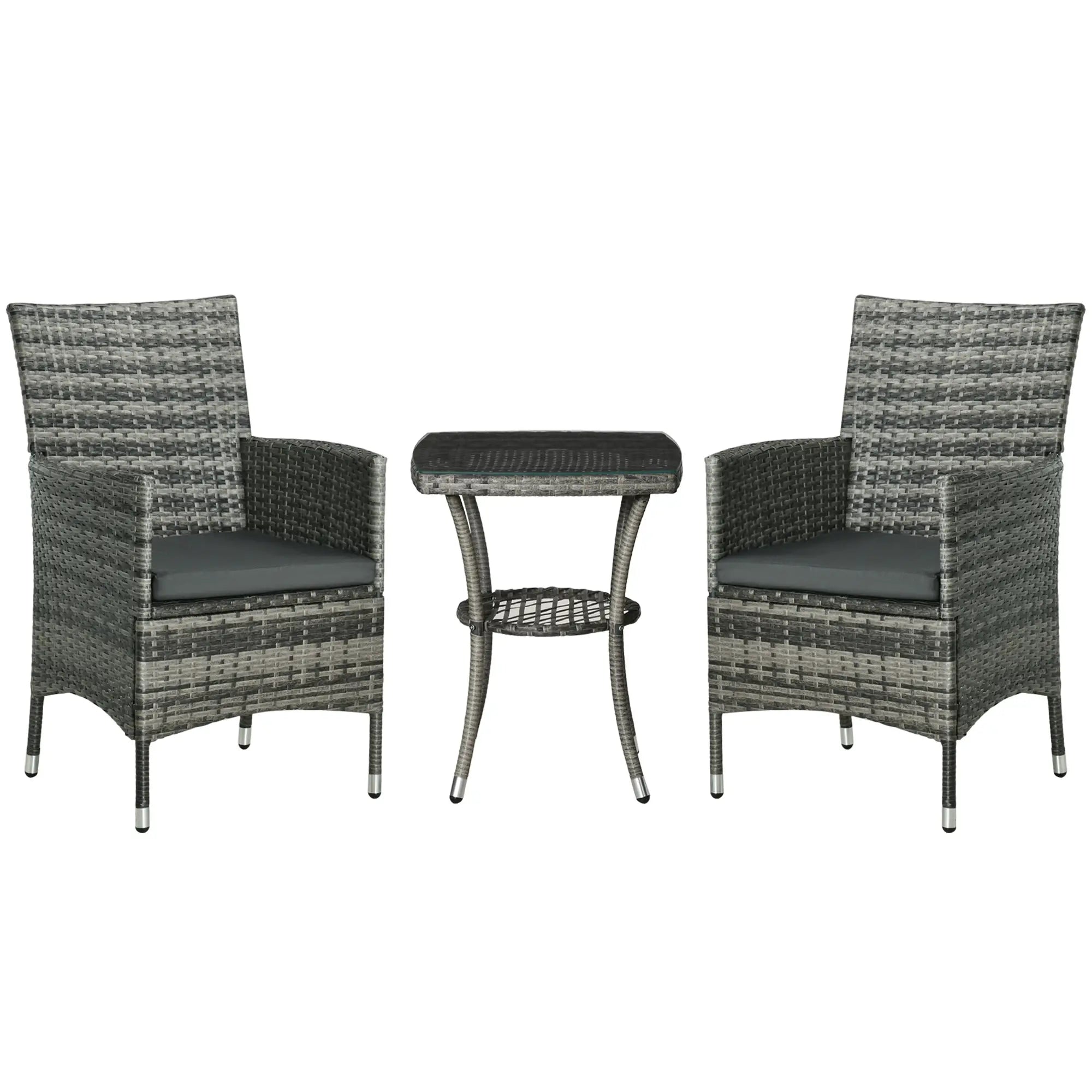 Outdoor furniture set with two wicker chairs and a small table on a white background