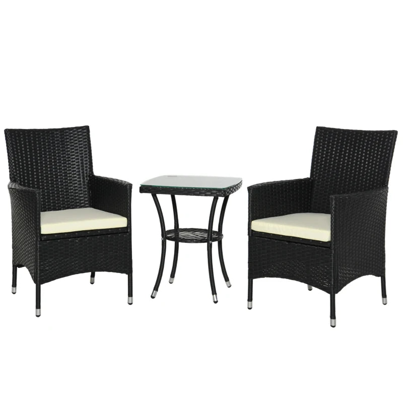 Black wicker outdoor furniture set with two chairs and a table on a white background