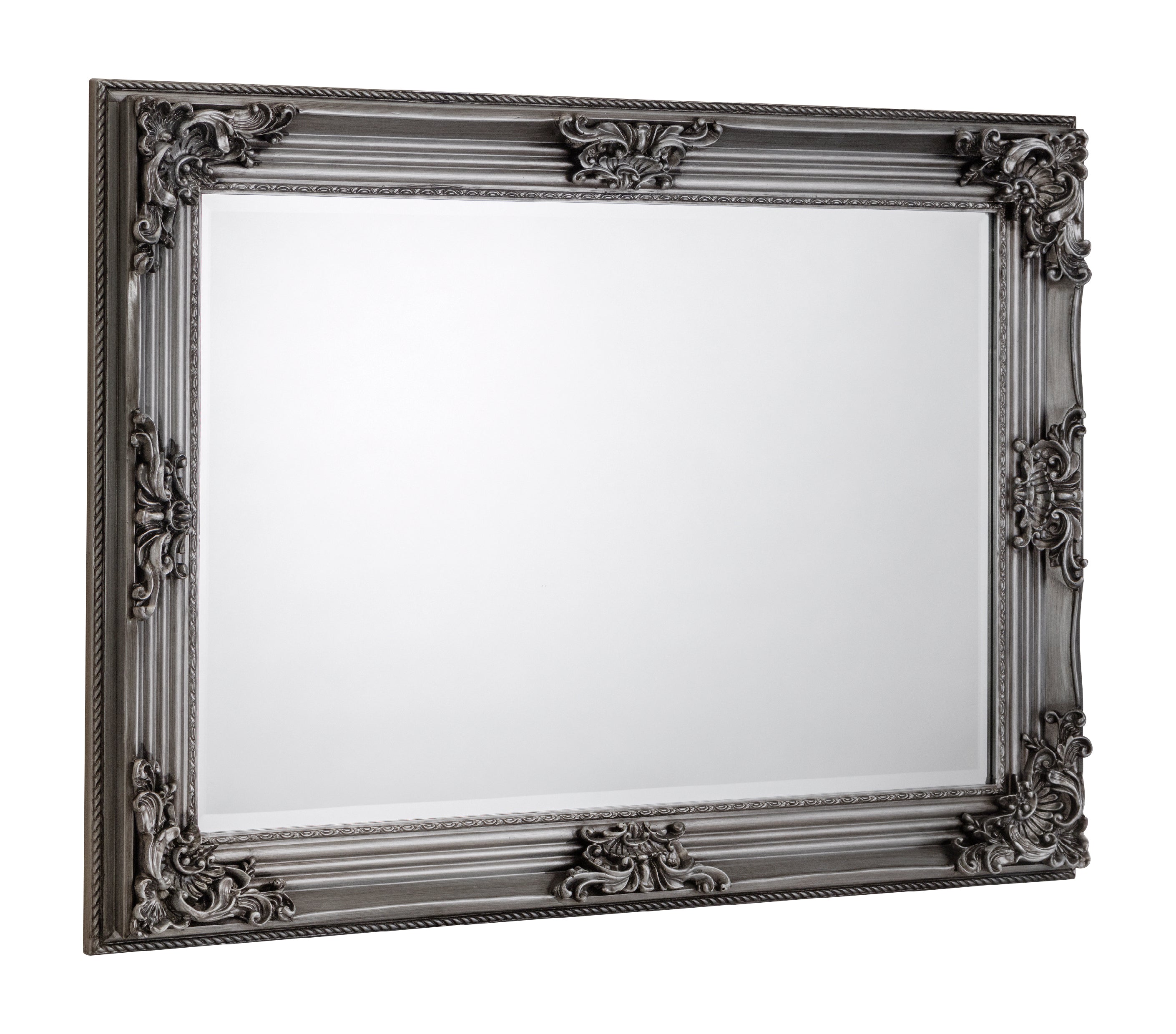 Decorative mirror with an ornate black frame on a white background