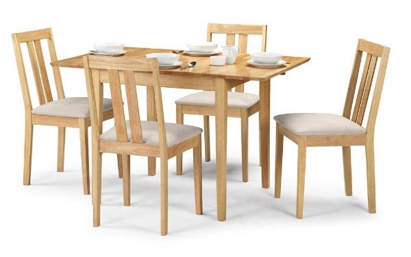 Wooden dining table set with four chairs on a white background