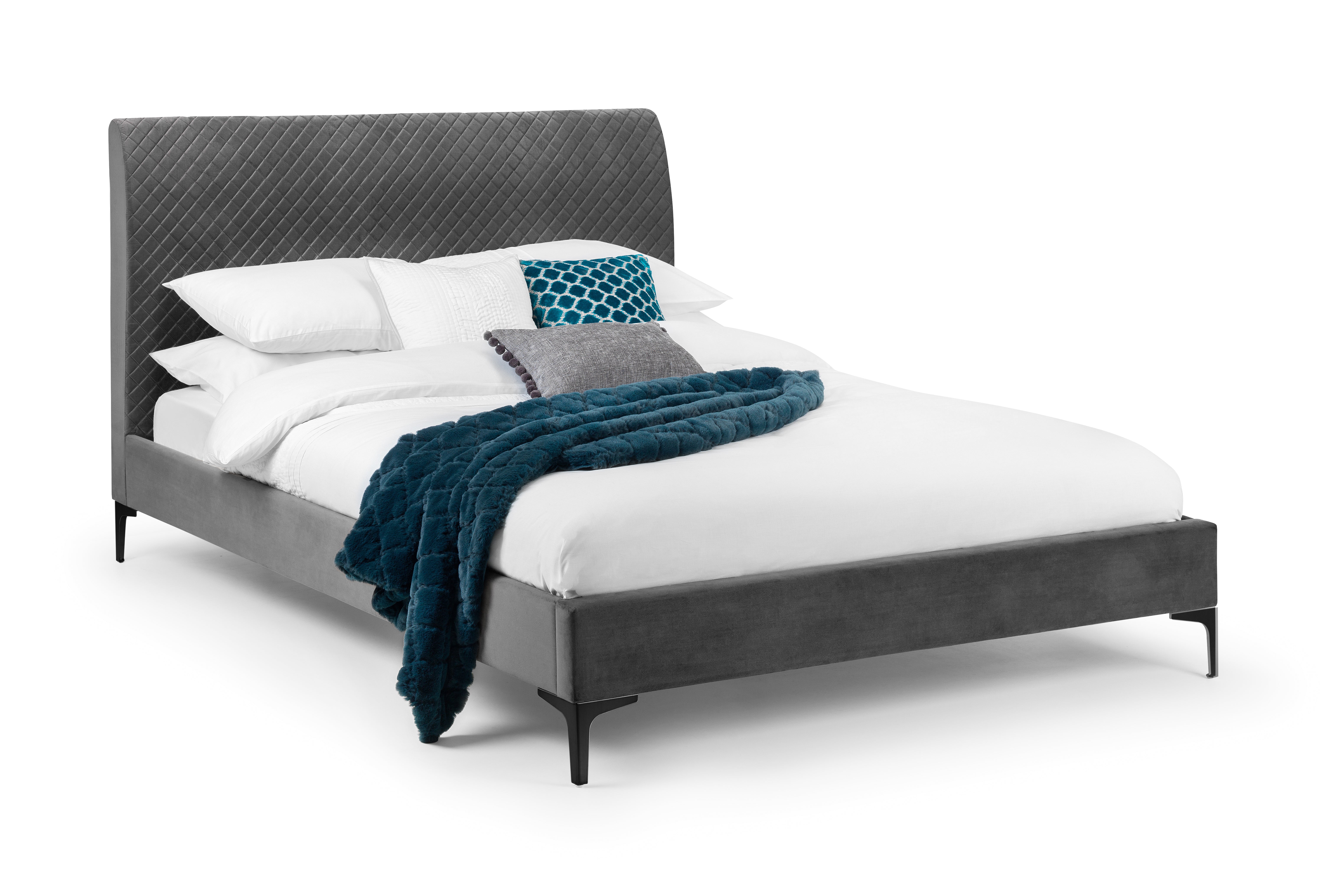 Bed with gray upholstered headboard, white bedding, and blue blanket on a white background