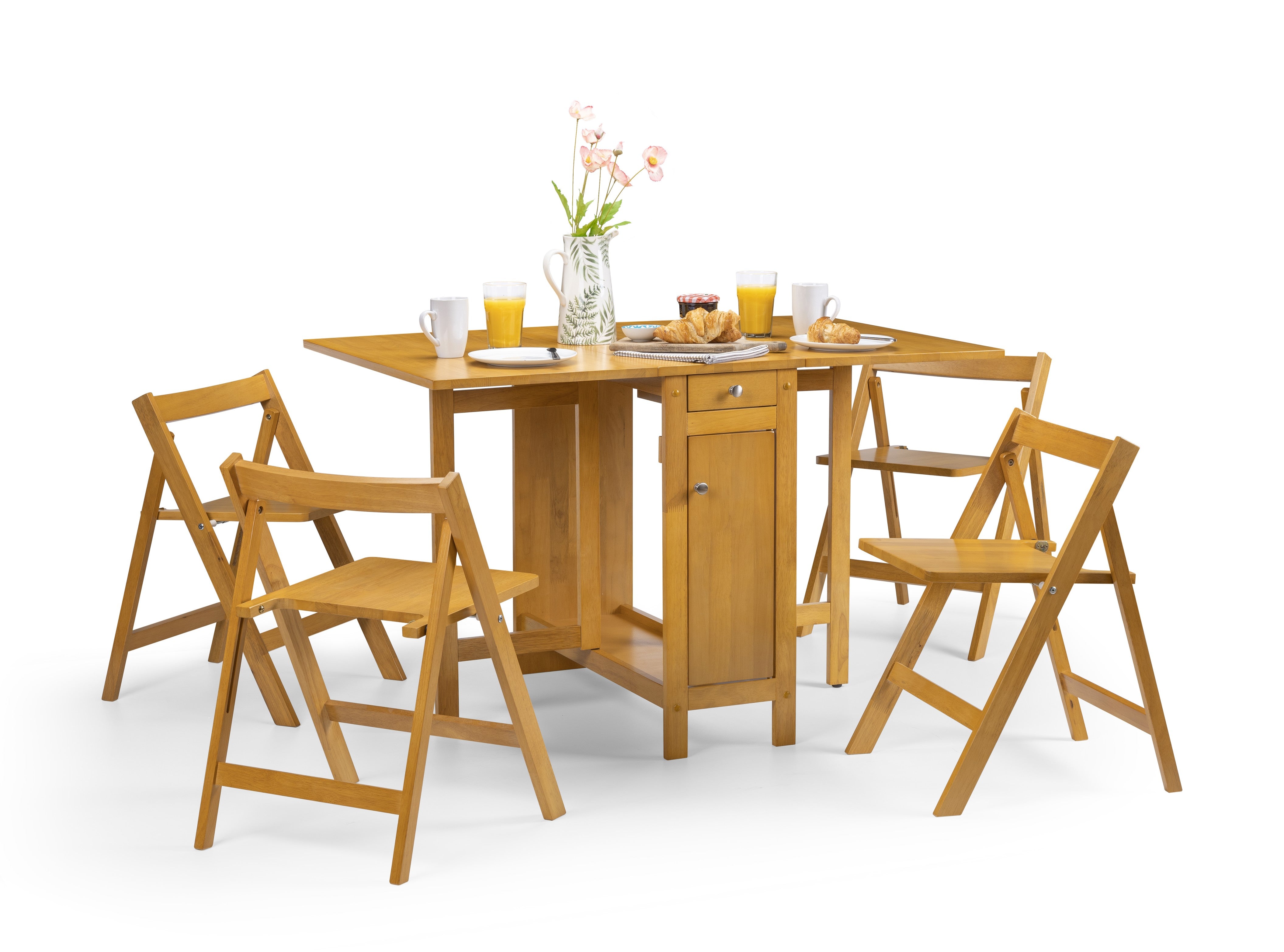 Wooden dining table with four matching chairs on a white background