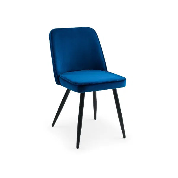 Blue velvet chair with black legs on a white background