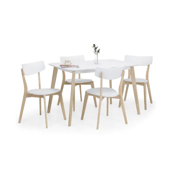 Dining table set with white chairs on a white background