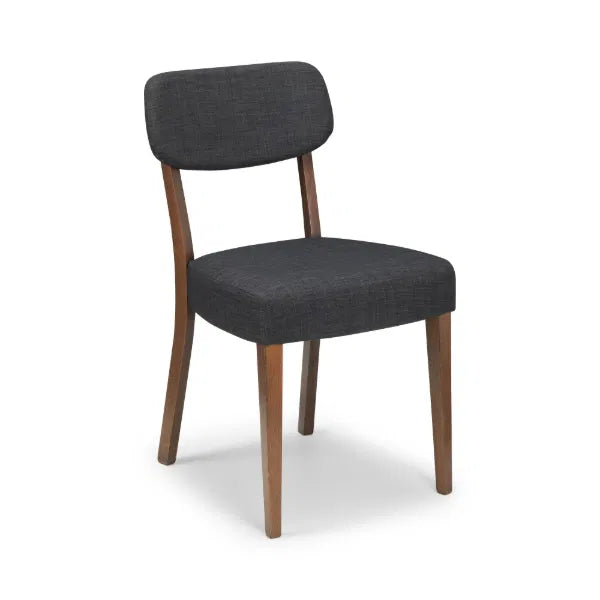 Dark gray upholstered chair with wooden legs on a white background