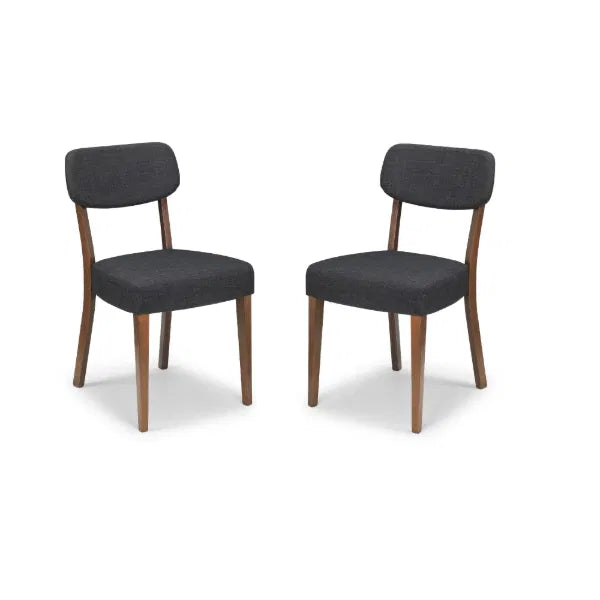 Two dark gray chairs with wooden legs on a white background