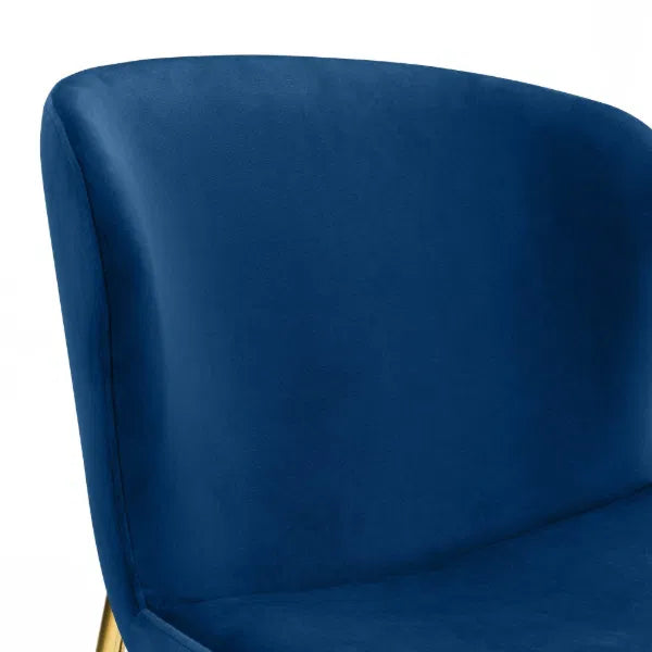 Blue chair with a gold base on a white background