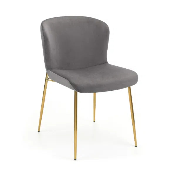 Gray chair with gold legs on a white background