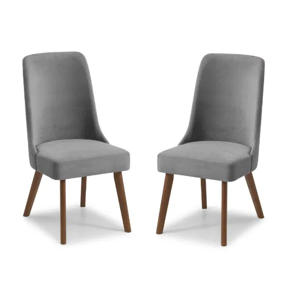Two gray chairs with wooden legs on a white background