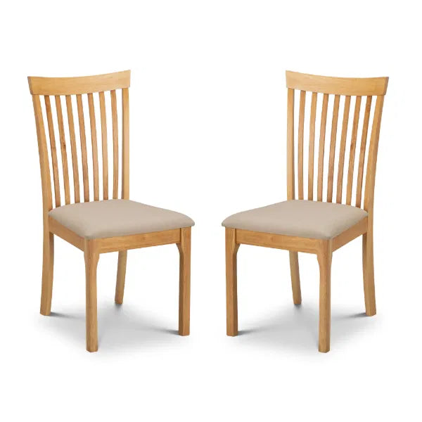 Two wooden chairs with beige cushions on a white background