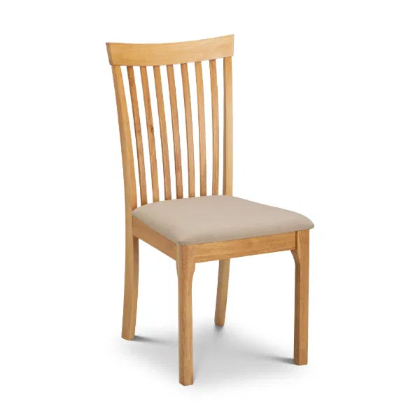 Wooden chair with a beige cushion on a white background