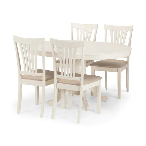 Dining table set with four chairs on a white background