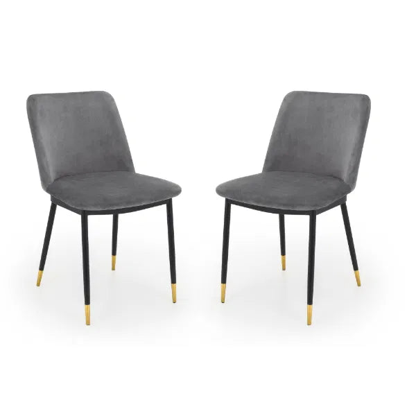 Two gray chairs with black legs on a white background
