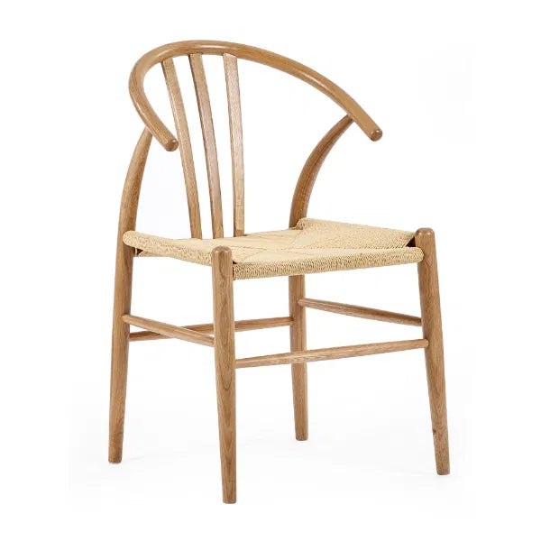 Wooden chair with woven seat on a white background