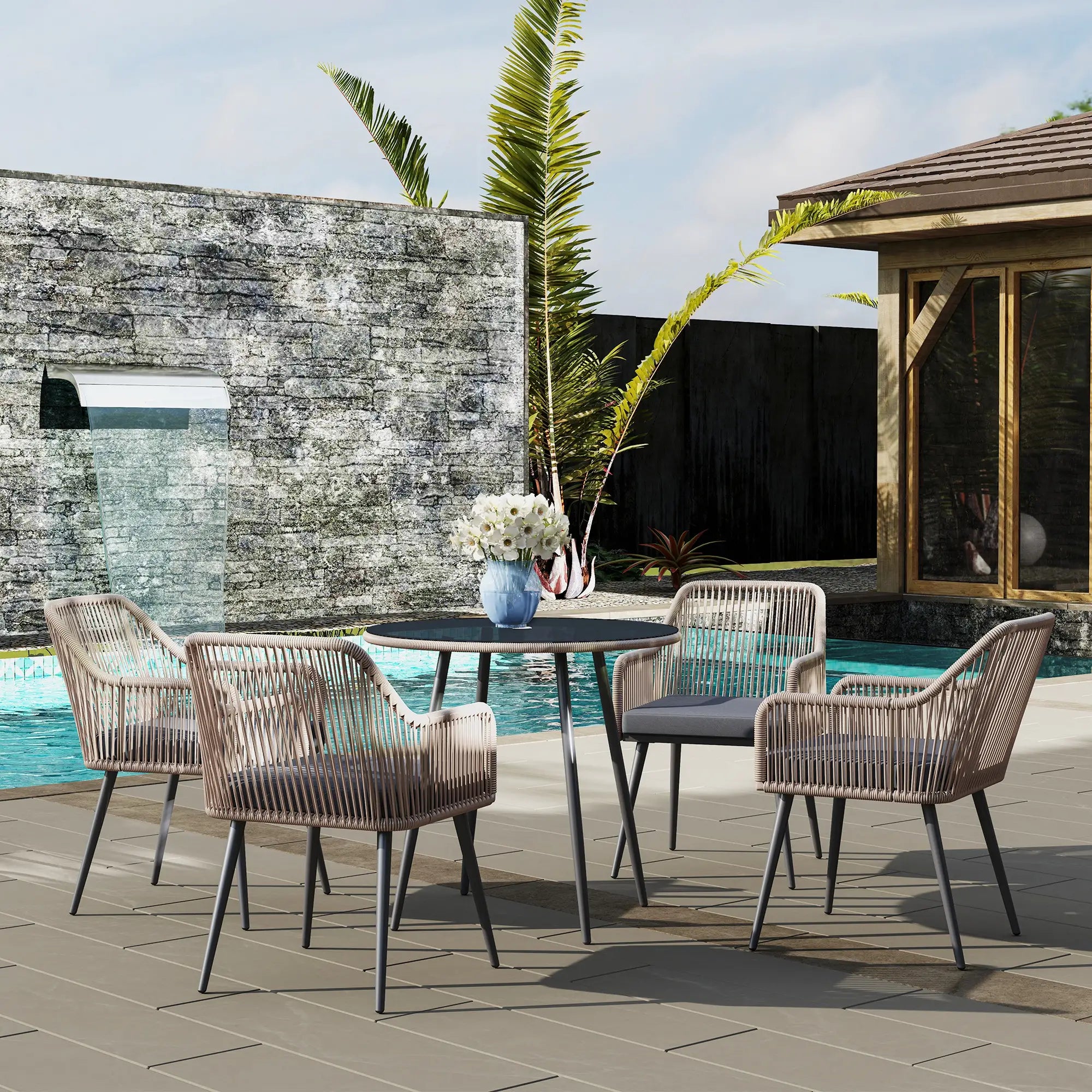 Outdoor dining set with table and chairs by a poolside
