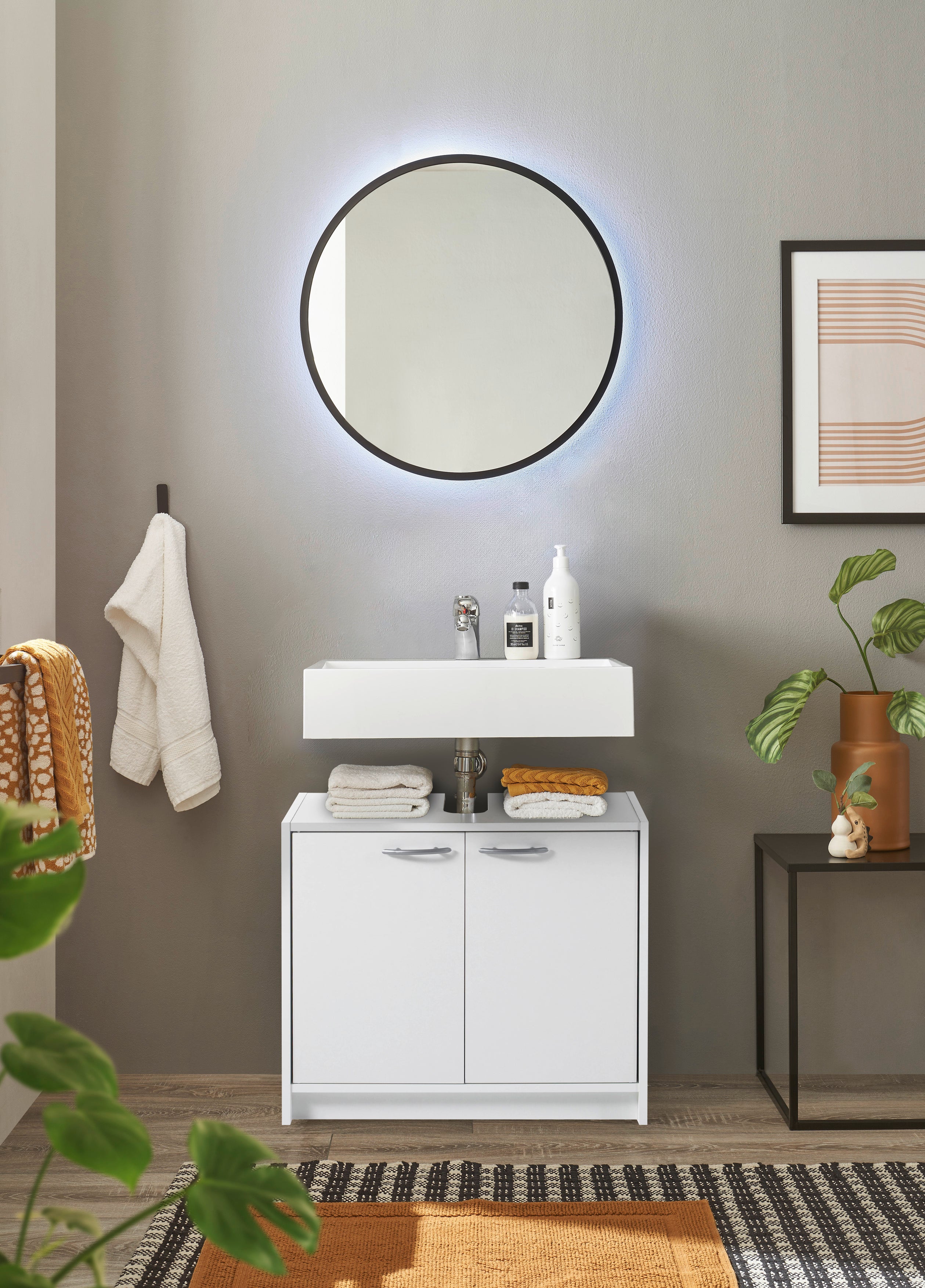 The Smash Under Sink Cabinet, a sleek white storage solution that maximizes space under the basin.