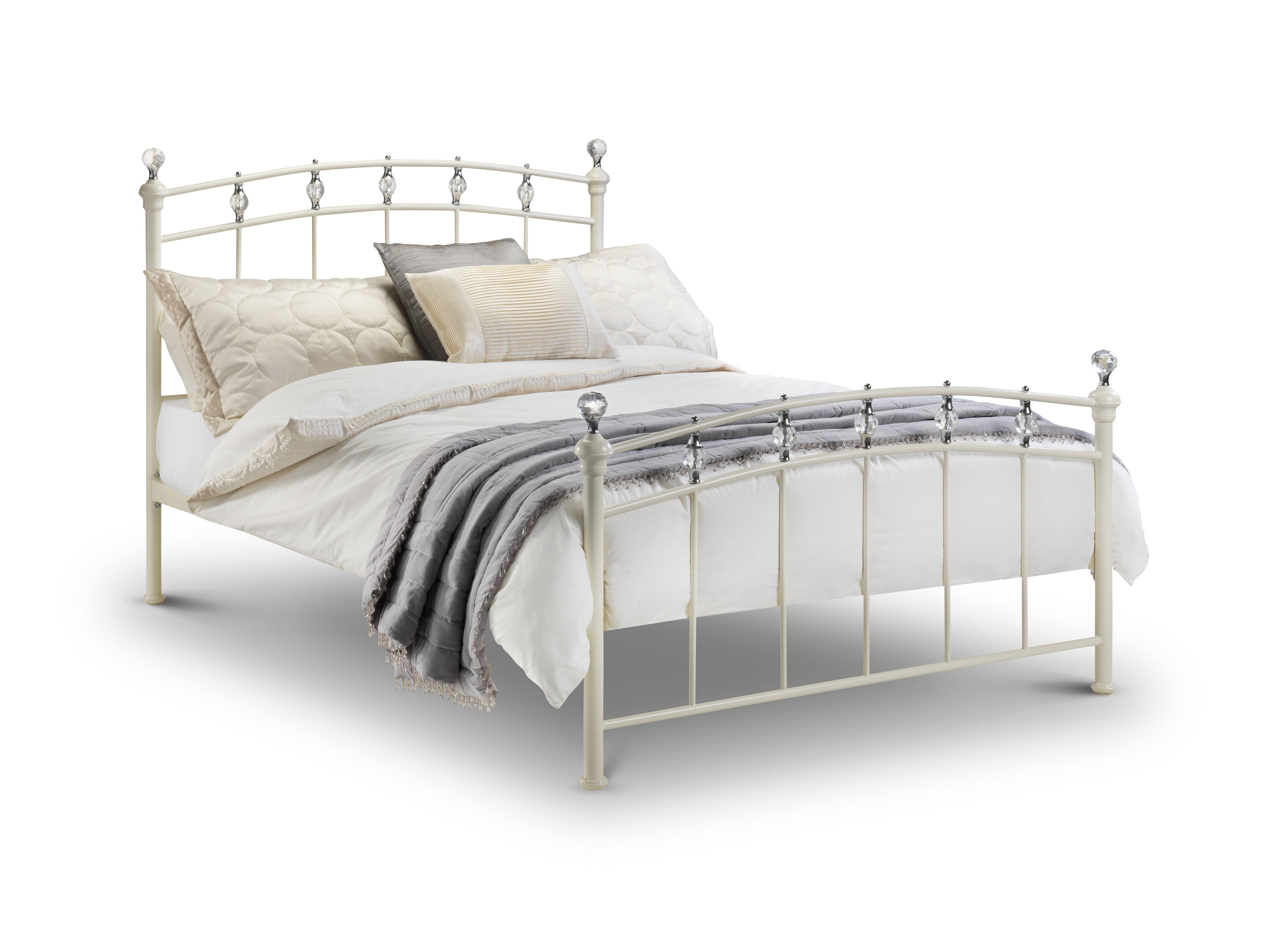 Metal bed frame with bedding on a white background