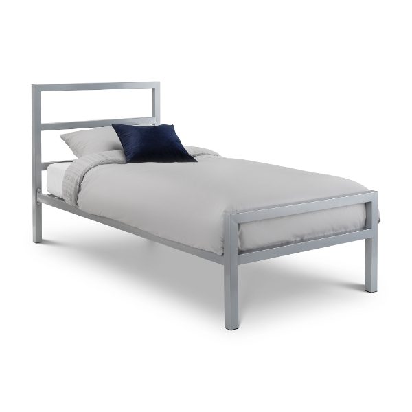 Gray metal bed frame with white bedding and a blue pillow on a white background