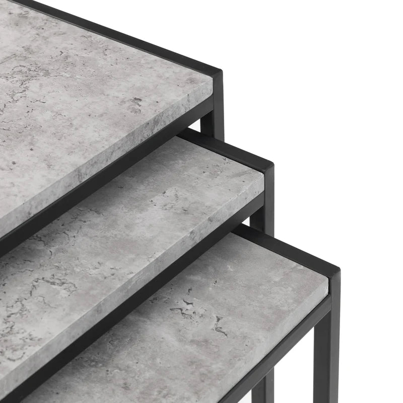 Set of three concrete steps with metal railings on a white background