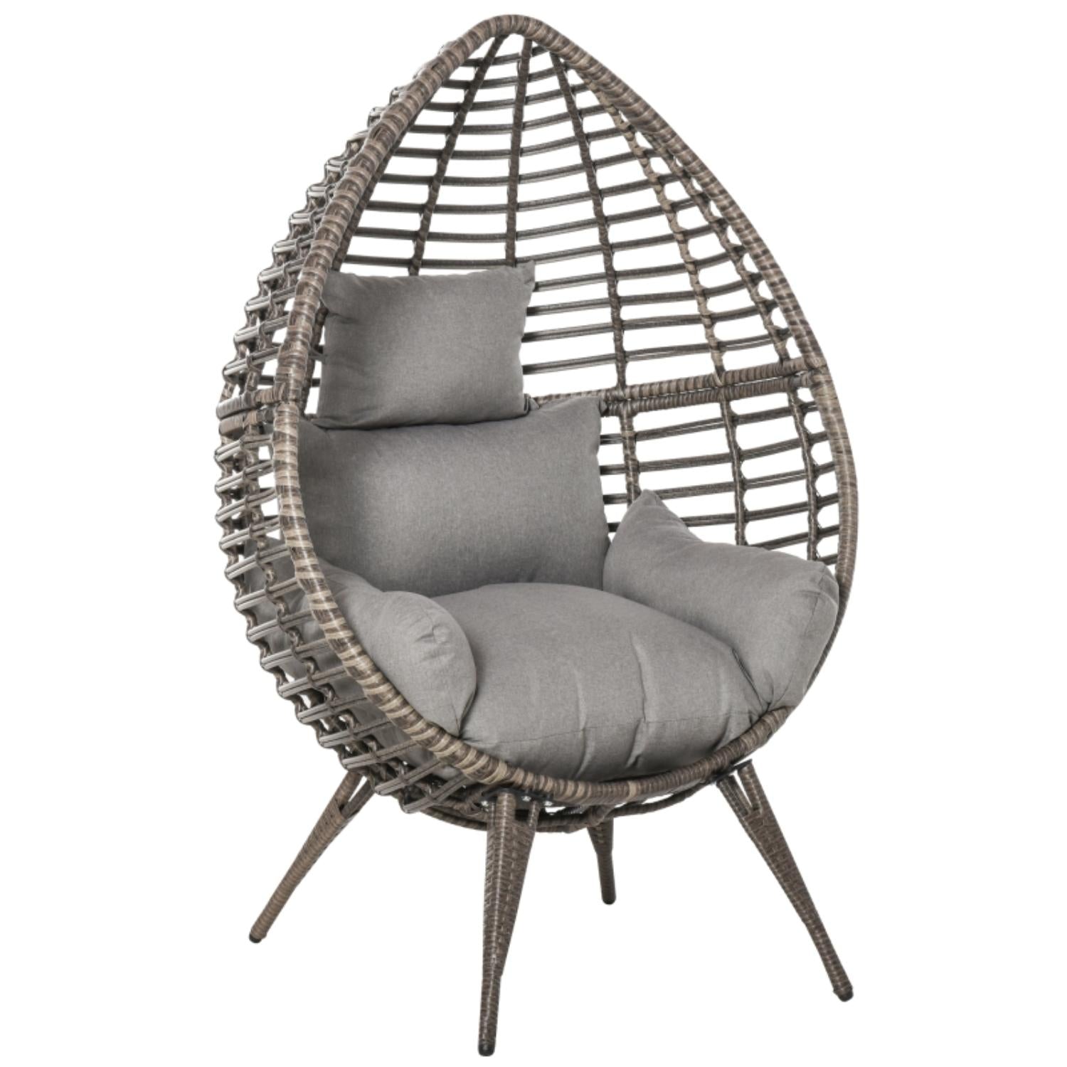Wicker egg-shaped chair with gray cushions on a white background