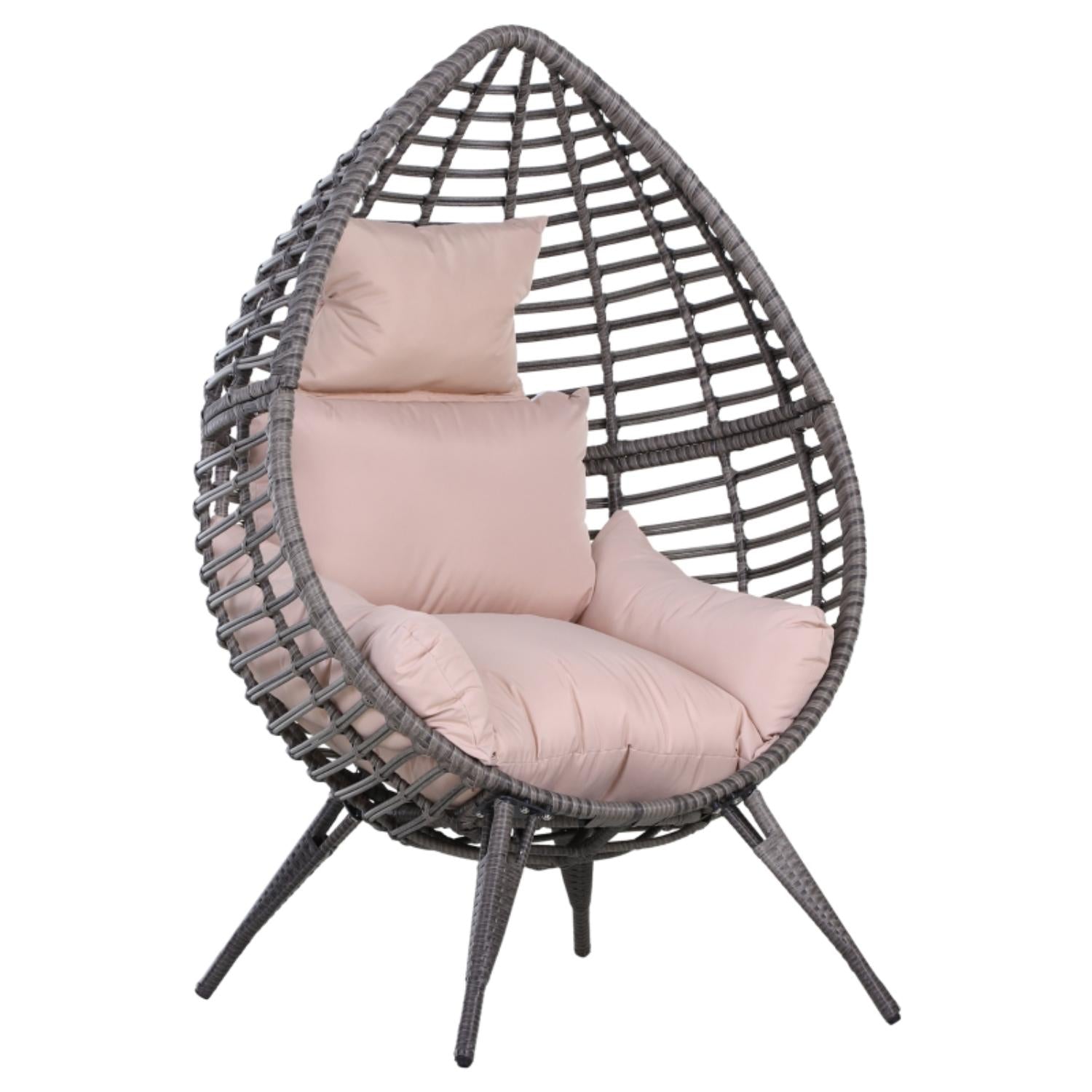 Wicker egg-shaped chair with pink cushions on a white background