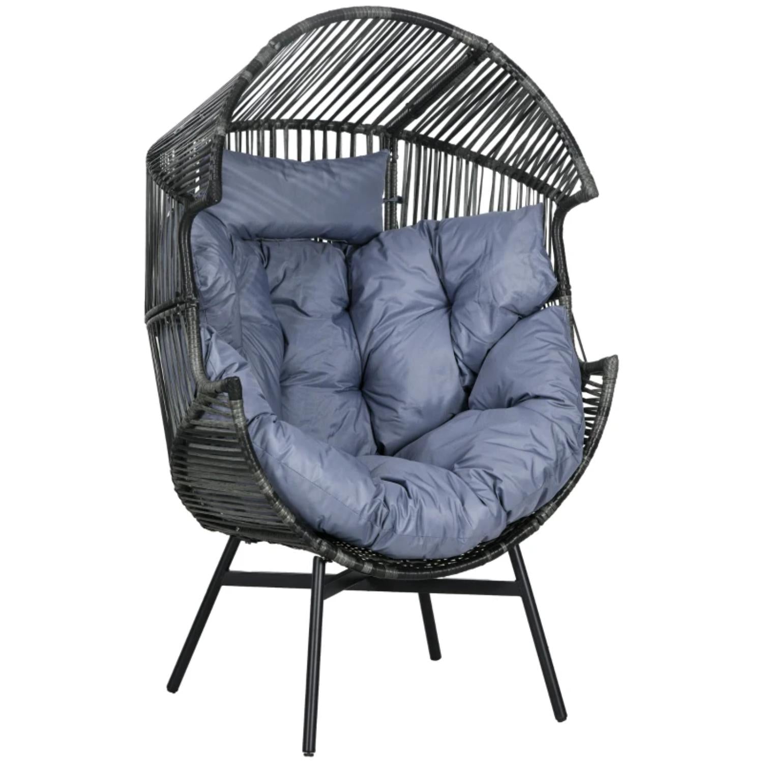 Black wicker chair with blue cushions on a white background