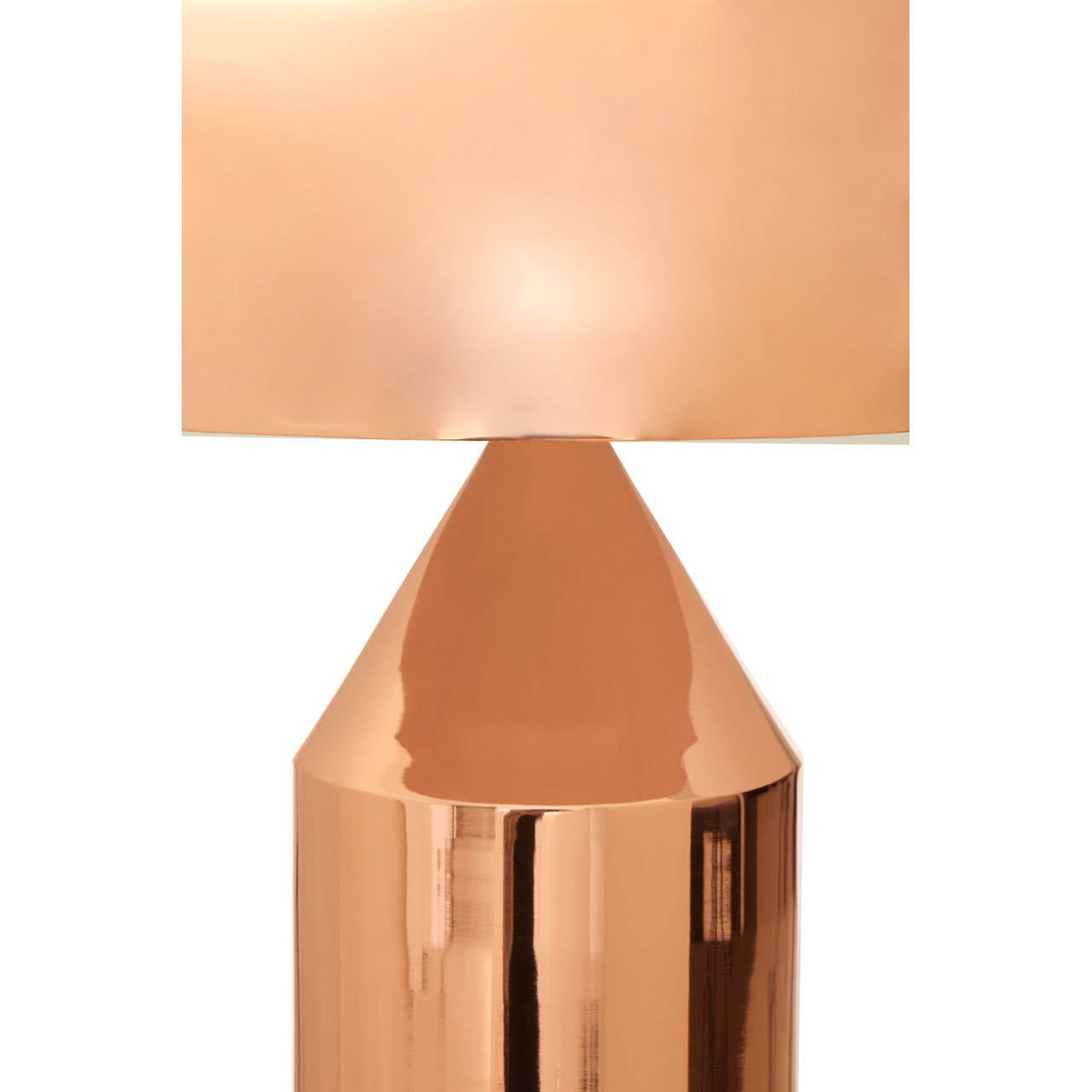 Rose gold table lamp with a white background