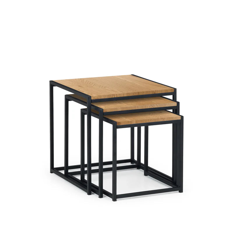 Set of two nesting tables with wooden tops and black metal frames on a white background