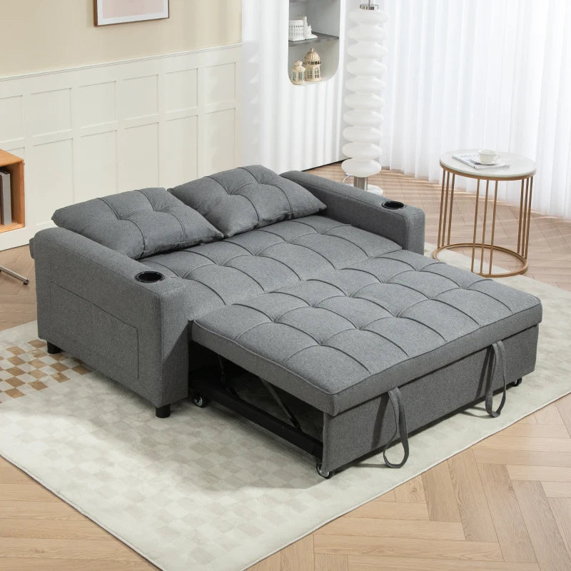 Gray sectional sofa with pull-out bed in a living room setting