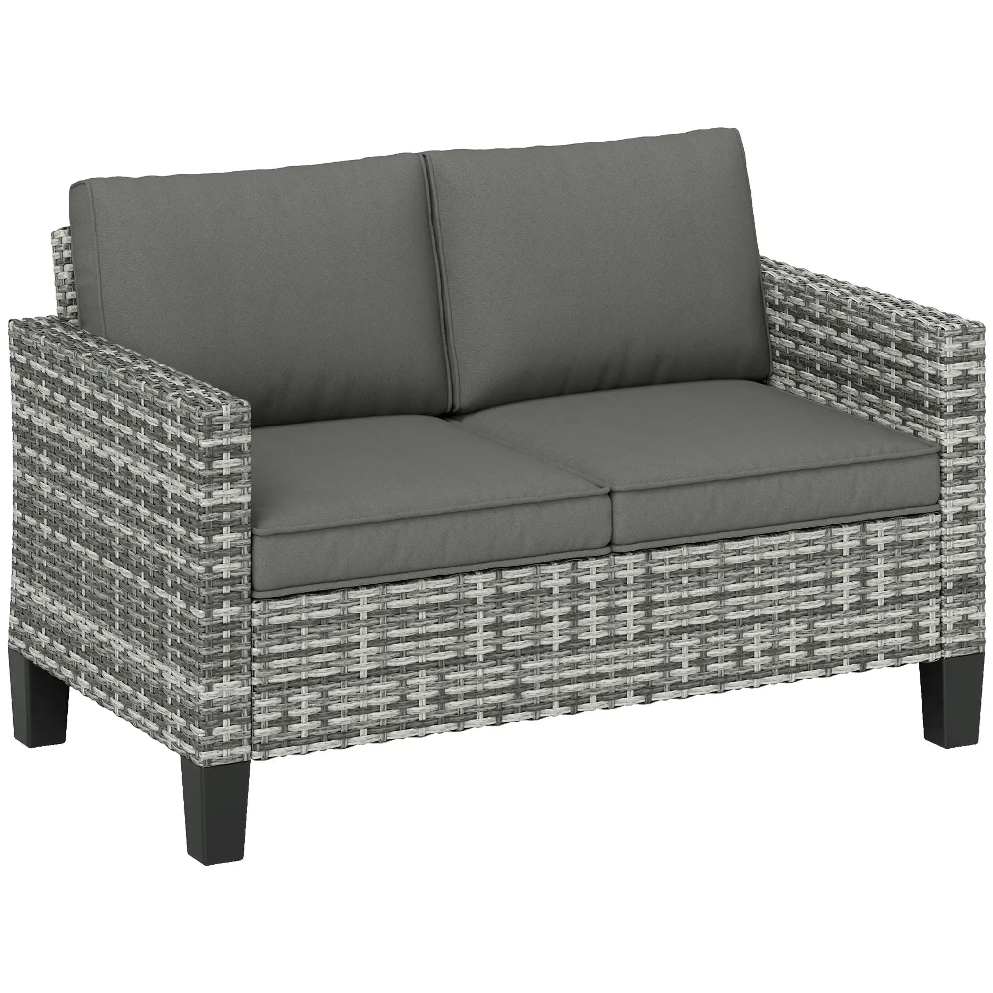 Gray wicker outdoor sofa with dark cushions on a white background