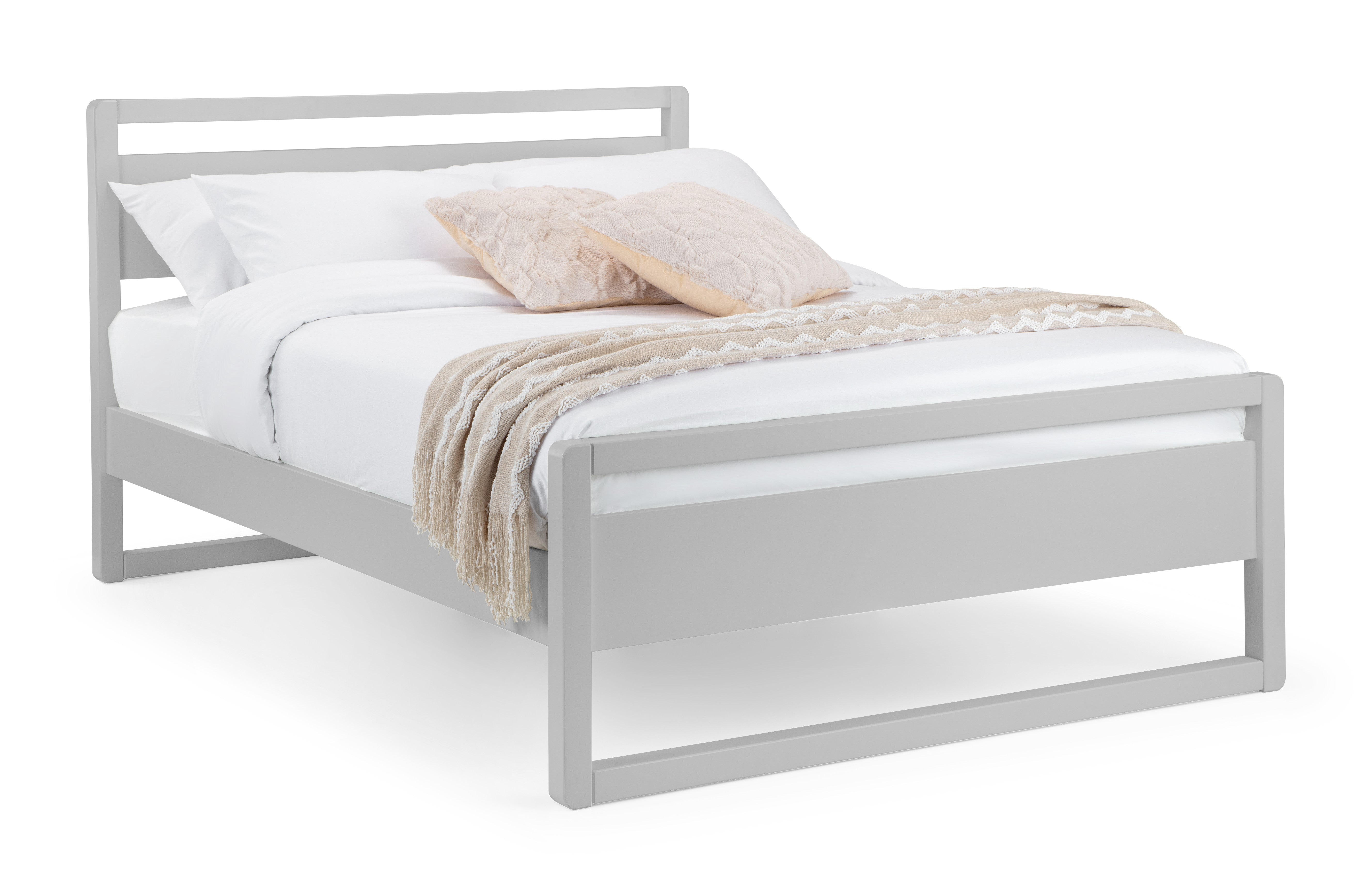 Grey metal bed frame with white bedding and a beige blanket and pillow on a white background