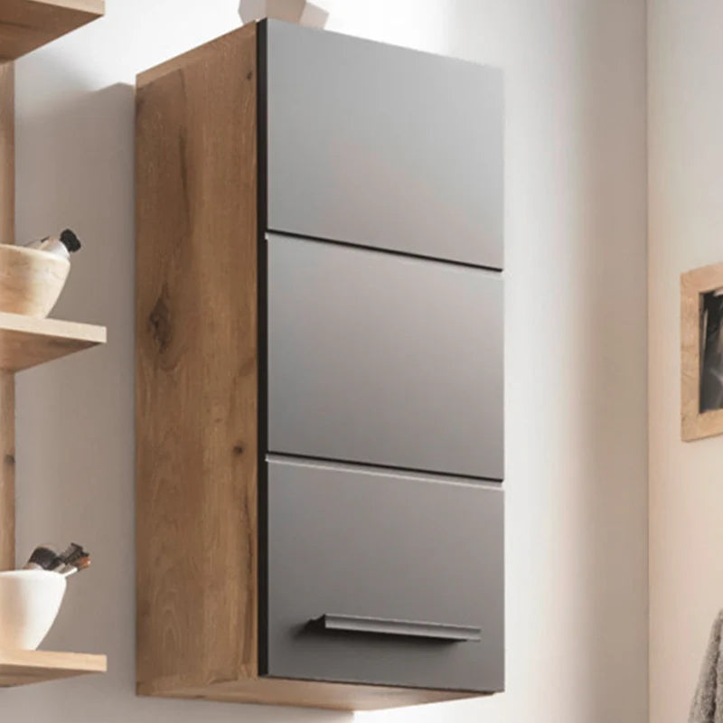 Gray kitchen cabinet with wooden frame on a white wall