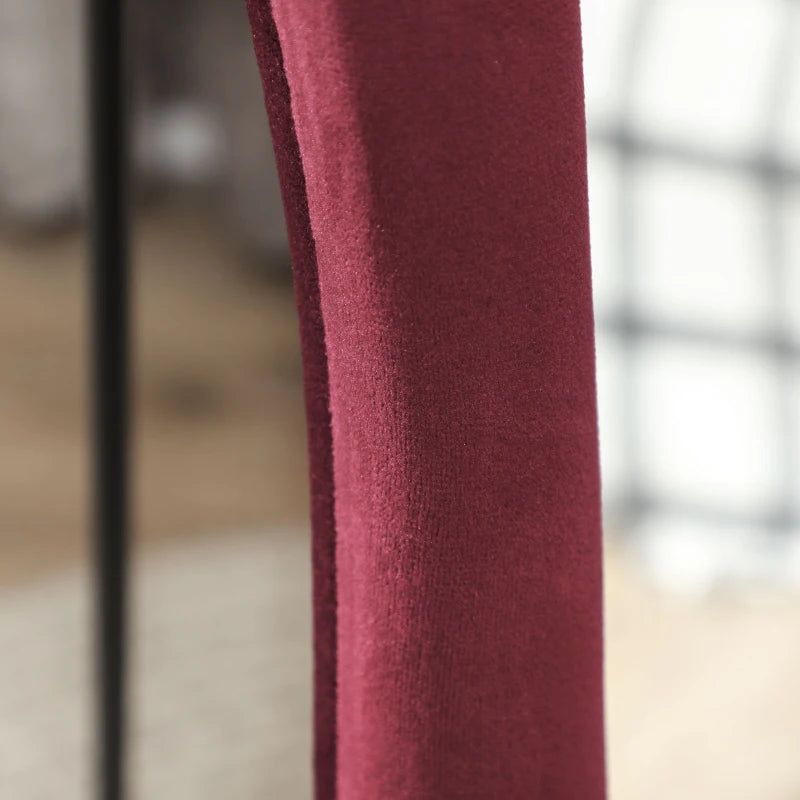 Close-up of a burgundy fabric texture with a blurred background